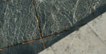 Natural Stone Cladding and Waterproofing Techniques for Luxury Hotel & Villa Poolside Designs
