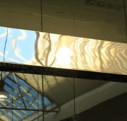 Bookmatched Marble and Backlit Onyx for Luxury Hotel Lobbies